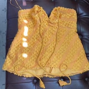 Anthropologie gold crop top with tassels